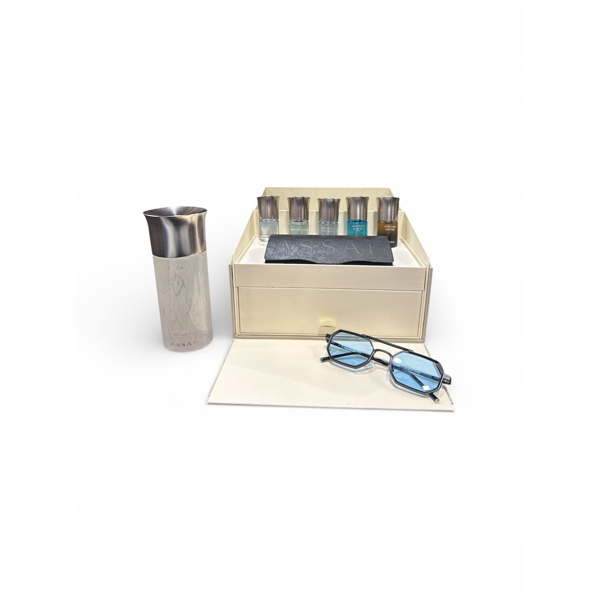 Assaf Aura Sunglasses Collection gift set displayed on a white background, featuring a luxury beige presentation box with multiple miniature fragrance bottles.