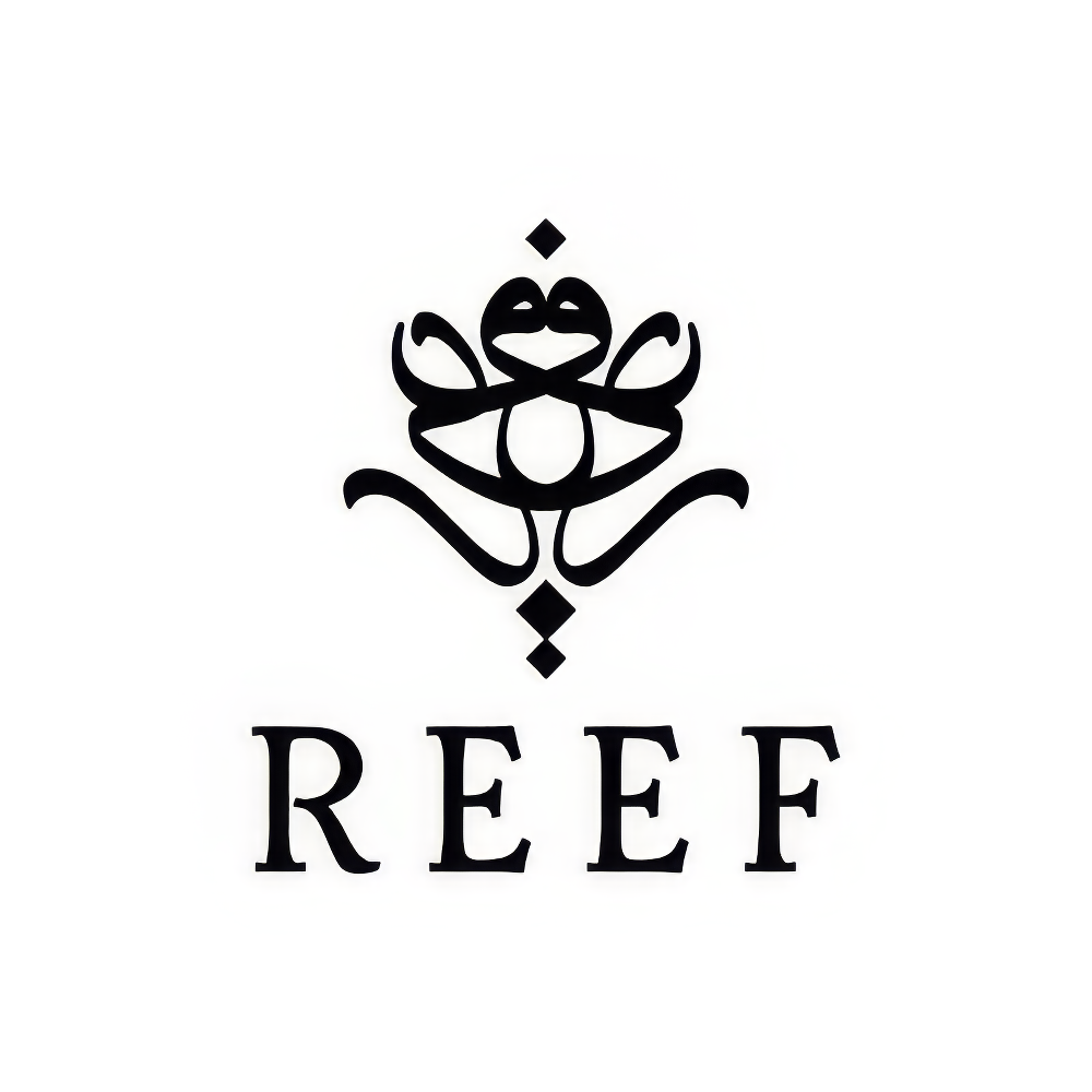 Black calligraphic motif above serif brand name 'Reef' on white background.