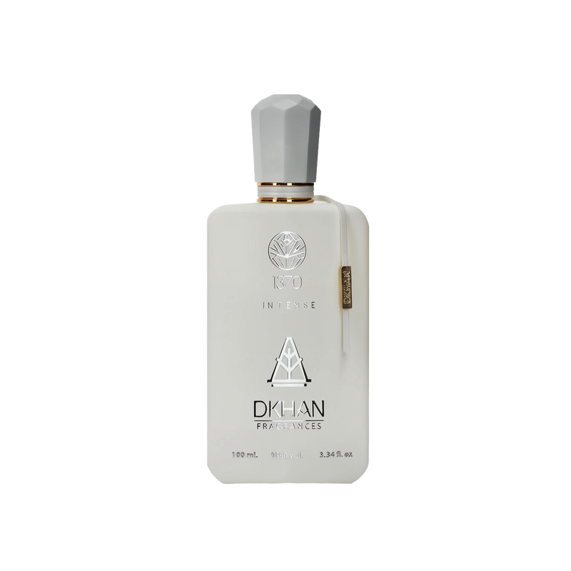 The image displays an elegant, matte-finished, frosted glass perfume bottle with a silver cap. On the front, the bottle is embossed with the number "1370" above the word "INTENSE", and below that is the emblem of "DKHAN FRAGRANCES". A leaf-like logo is printed above the number "1370". On the side of the bottle is a slender vertical label with additional branding details.