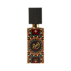 Image of a perfume bottle with a distinctive design. The bottle features a geometric and floral pattern in orange, black, and teal, with a circular black label in the center that has gold Arabic calligraphy and the word 'AJWAD' beneath it. The brand 'Lattafa' is written at the bottom. The cap is black with a textured appearance, resembling wood, and a gold neck. The background is pure white.