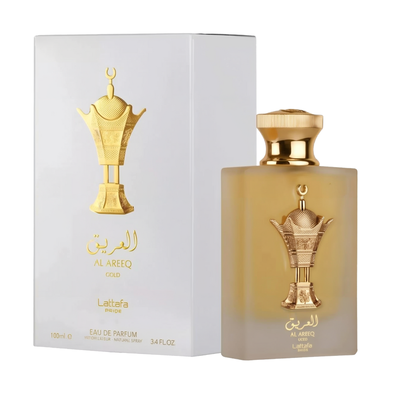 The image shows a perfume bottle and packaging from Lattafa named "Al Areeq Gold." The bottle has a rectangular, gold design with a golden cap and features an ornate gold emblem.