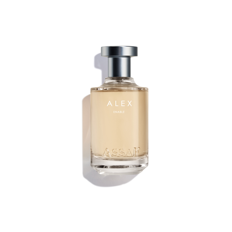 Alex Enable by Assaf clear glass perfume bottle with light beige liquid and silver cap.