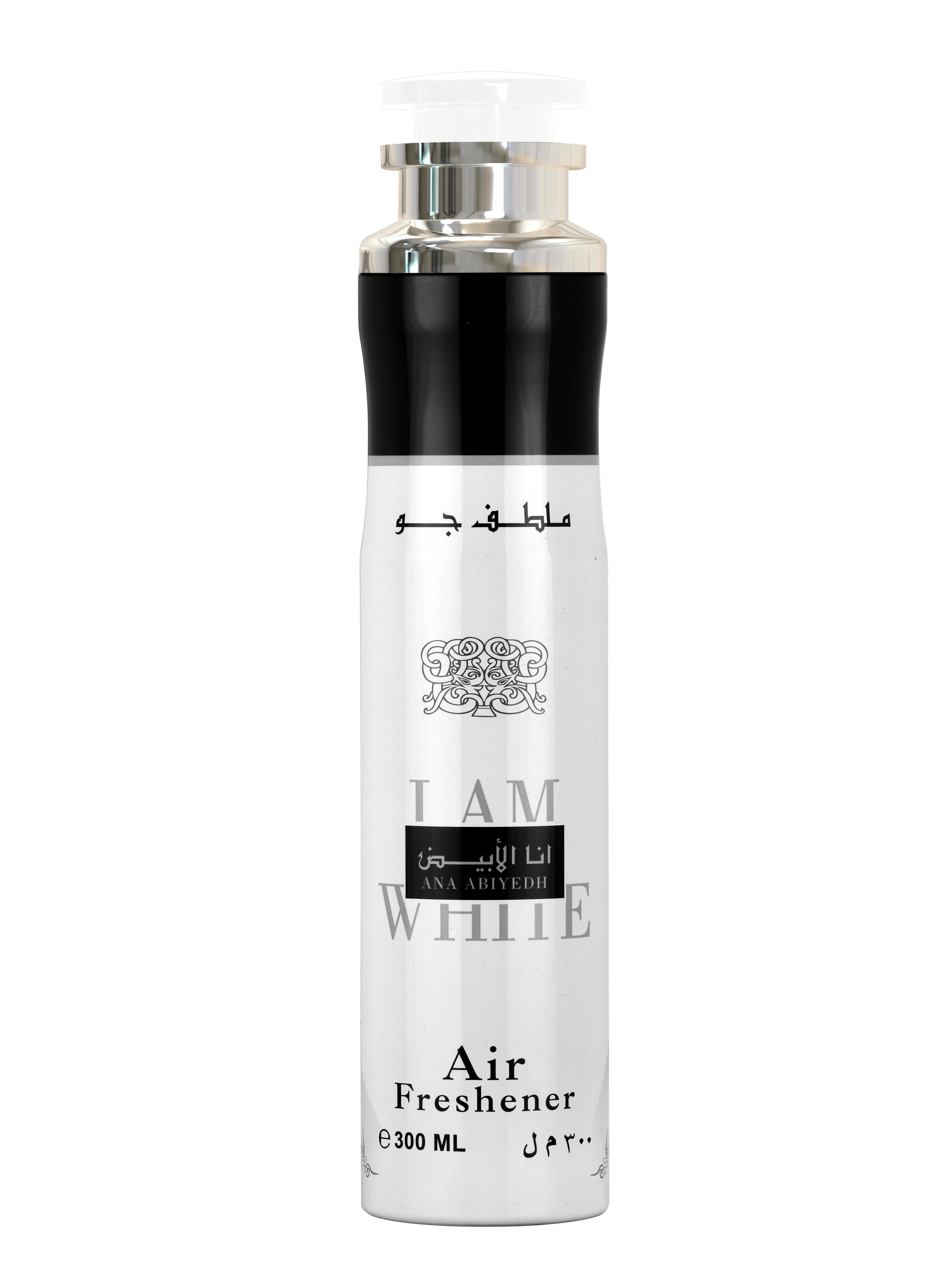 A tall cylindrical can of 'Ana Abiyedh' Air Freshener by Lattafa, predominantly white with black text and a silver top, featuring Arabic script and 'I AM WHITE' on the front.