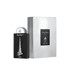 The image shows a perfume bottle and packaging from Lattafa Pride, branded as "Art of Arabia I." The perfume bottle has a sleek black design with a silver depiction of a tall, iconic skyscraper, resembling the Burj Khalifa, embossed on the front. The bott