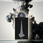 Lattafa Pride Art of Arabia I perfume box featuring a silver Burj Khalifa emblem, surrounded by dramatic black and metallic ink.