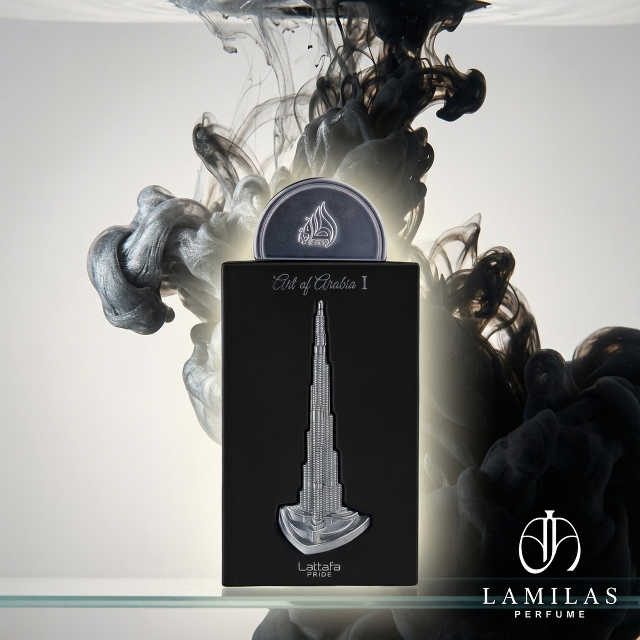 Lattafa Pride Art of Arabia I perfume box featuring a silver Burj Khalifa emblem, surrounded by dramatic black and metallic ink.