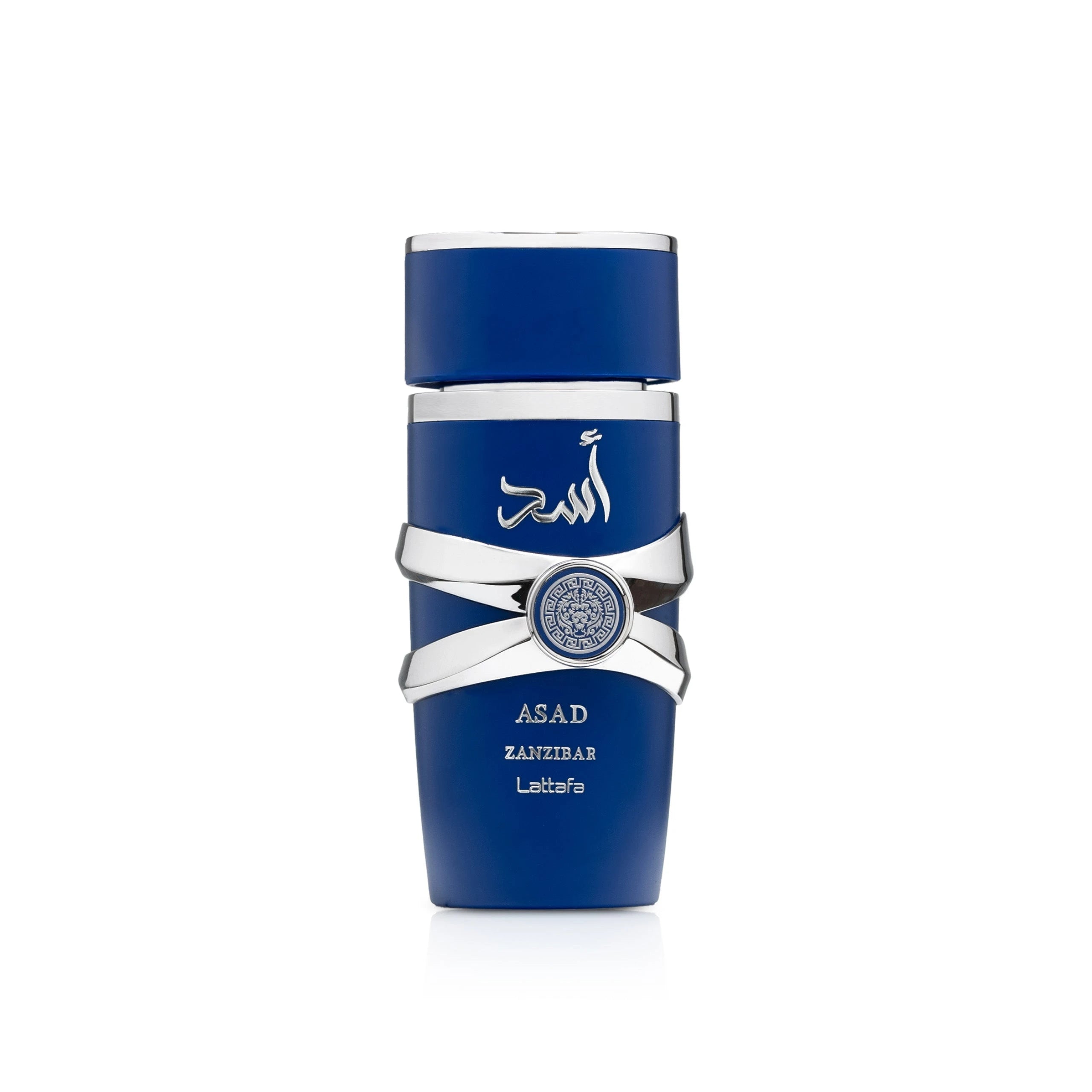 A tall, deep-blue cylindrical perfume bottle with silver decorative bands crossing around the middle, featuring Arabic text on the upper portion and labeled “Asad Zanzibar” by Lattafa.