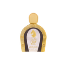 The image shows a product, likely a bottle of perfume, presented against a white background for a clean and professional look. The bottle has a distinctive horseshoe shape with a gold color scheme. It features a white label with golden edges, showcasing an embossed golden horse's head and Arabic calligraphy.  The cap of the bottle is textured, suggesting a design that complements the luxurious appearance.