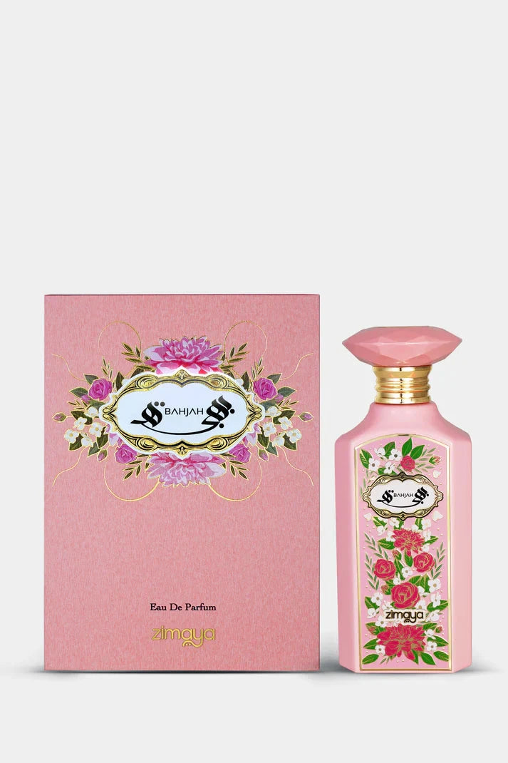 Bahjah Eau de Parfum by Zimaya. The image features a pink perfume bottle and its matching packaging. The bottle has a faceted cap and is adorned with a floral design, showcasing pink and white flowers with green leaves. The label on the bottle features th