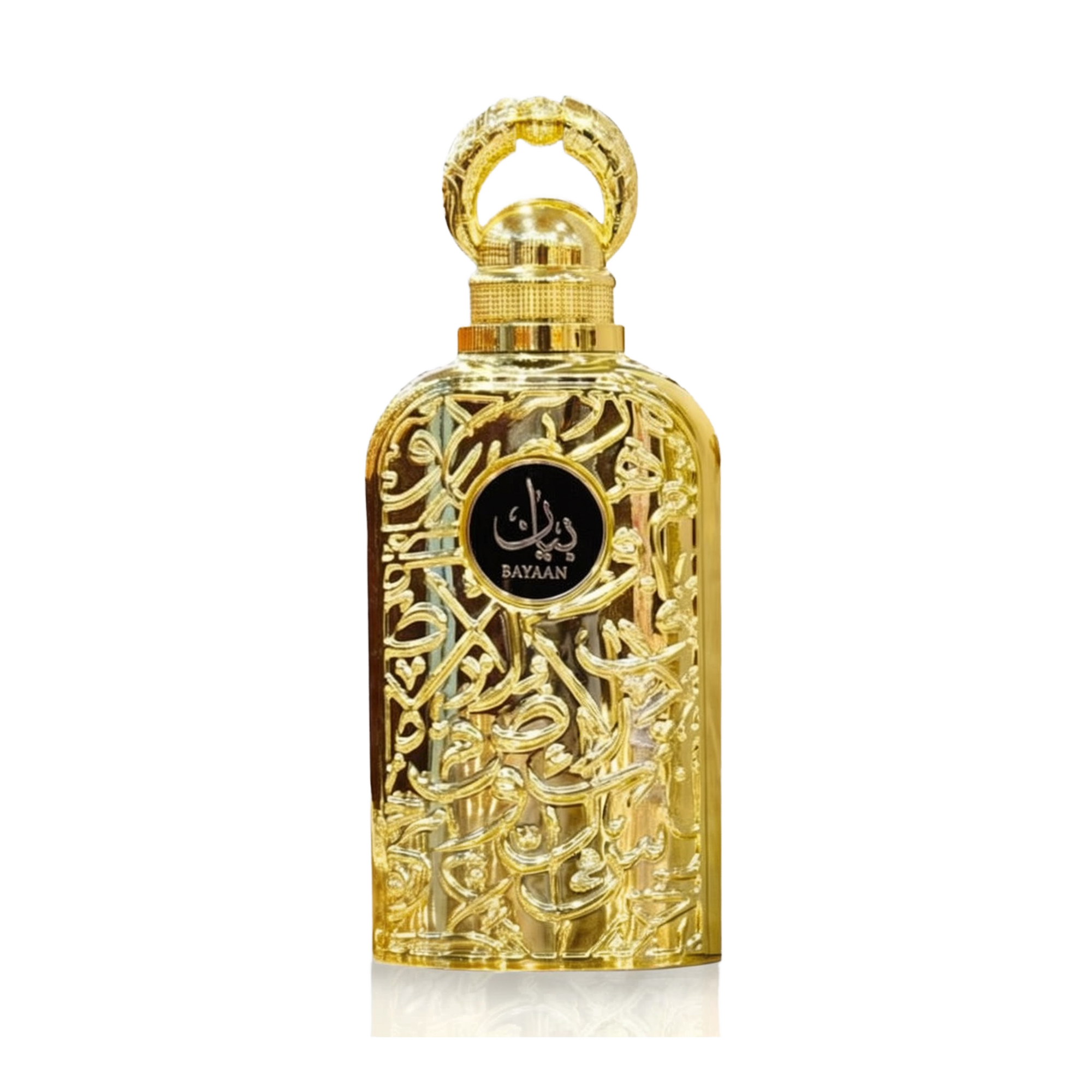 The image shows a luxurious perfume bottle. The bottle has a golden color with intricate arabesque patterns carved into its metal exterior, giving it a very ornate and decorative appearance. The cap of the bottle is also golden and has a circular handle, likely for aesthetic purposes. In the center of the bottle, there is a black label with the word "BAYAAN" written in stylized white Arabic script. The background is plain, highlighting the detailed craftsmanship and opulent design of the perfume bottle.