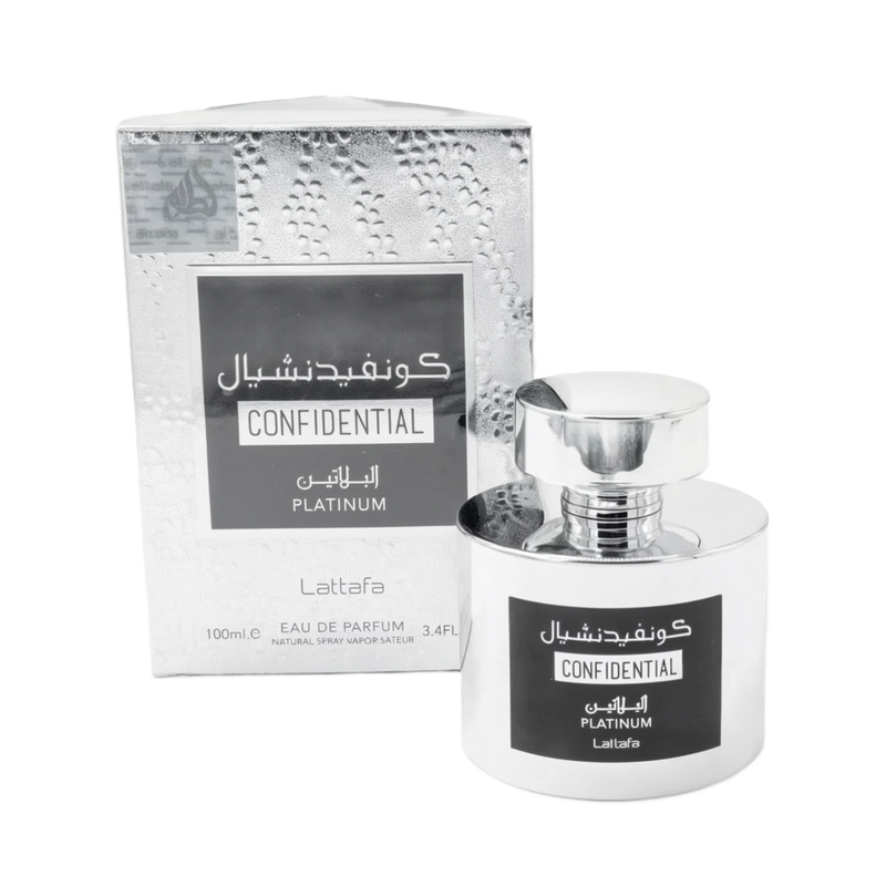 The image shows a shiny, metallic silver perfume bottle from Lattafa with the name "Confidential Platinum" written in both Arabic and English. The bottle has a round shape with a large, cylindrical cap that mirrors the silver finish. The packaging box, al