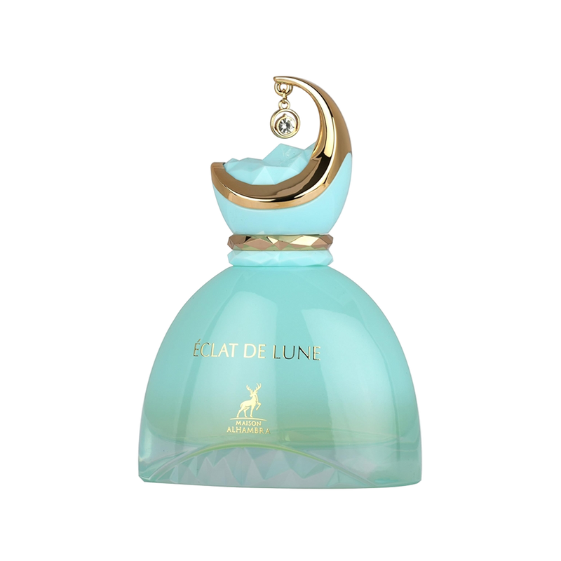 Turquoise perfume bottle with gold crescent moon cap and crystal charm, labeled Éclat de Lune by Maison Alhambra.