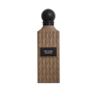 Brown geometric perfume bottle with black round cap and a label reading “Grey Pearl Diamond”.
