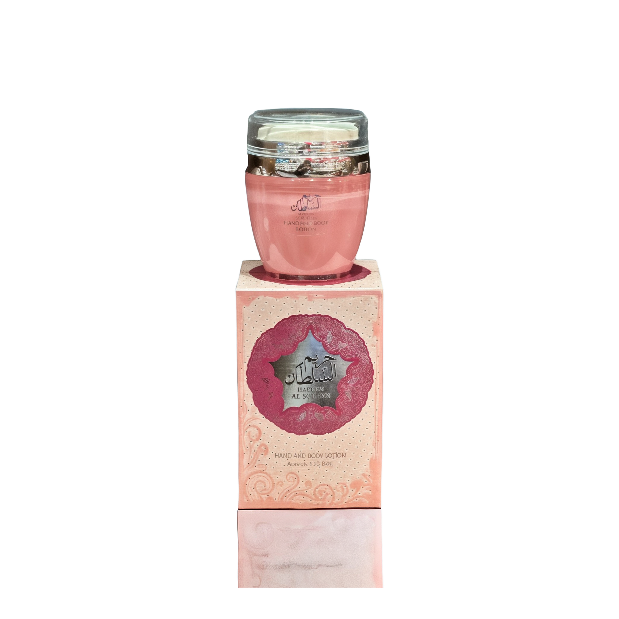 The image shows a product named "Hareem Al Sultan Hand and Body Lotion." The lotion comes in a pink container with a clear lid and is placed on top of a matching pink box adorned with intricate patterns and Arabic calligraphy. The box prominently features the product name "Hareem Al Sultan" within an ornate design in pink and silver. The elegant and regal packaging suggests a luxurious and high-quality skincare product. The container holds approximately 1.53 fluid ounces of lotion.