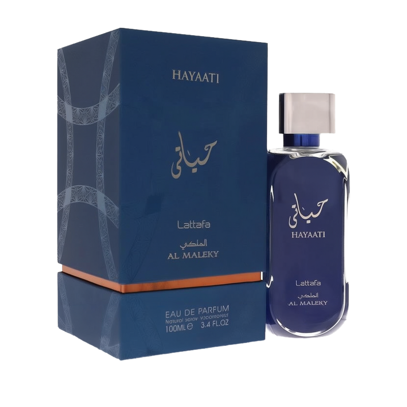 Image of Lattafa Hayaati Al Maleky Eau De Parfum bottle and packaging. The packaging is dark blue with silver text, featuring both English and Arabic lettering. The bottle is also dark blue, with a sleek design and a silver cap. The label on the bottle re