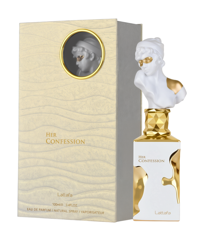 A rectangular, cream-colored box with “Her Confession” in gold lettering stands beside a matching perfume bottle by Lattafa. The bottle’s cap is a white, classical-style bust wearing a gold eye mask, and the faceted gold neck leads to a white bottle with gold accents.