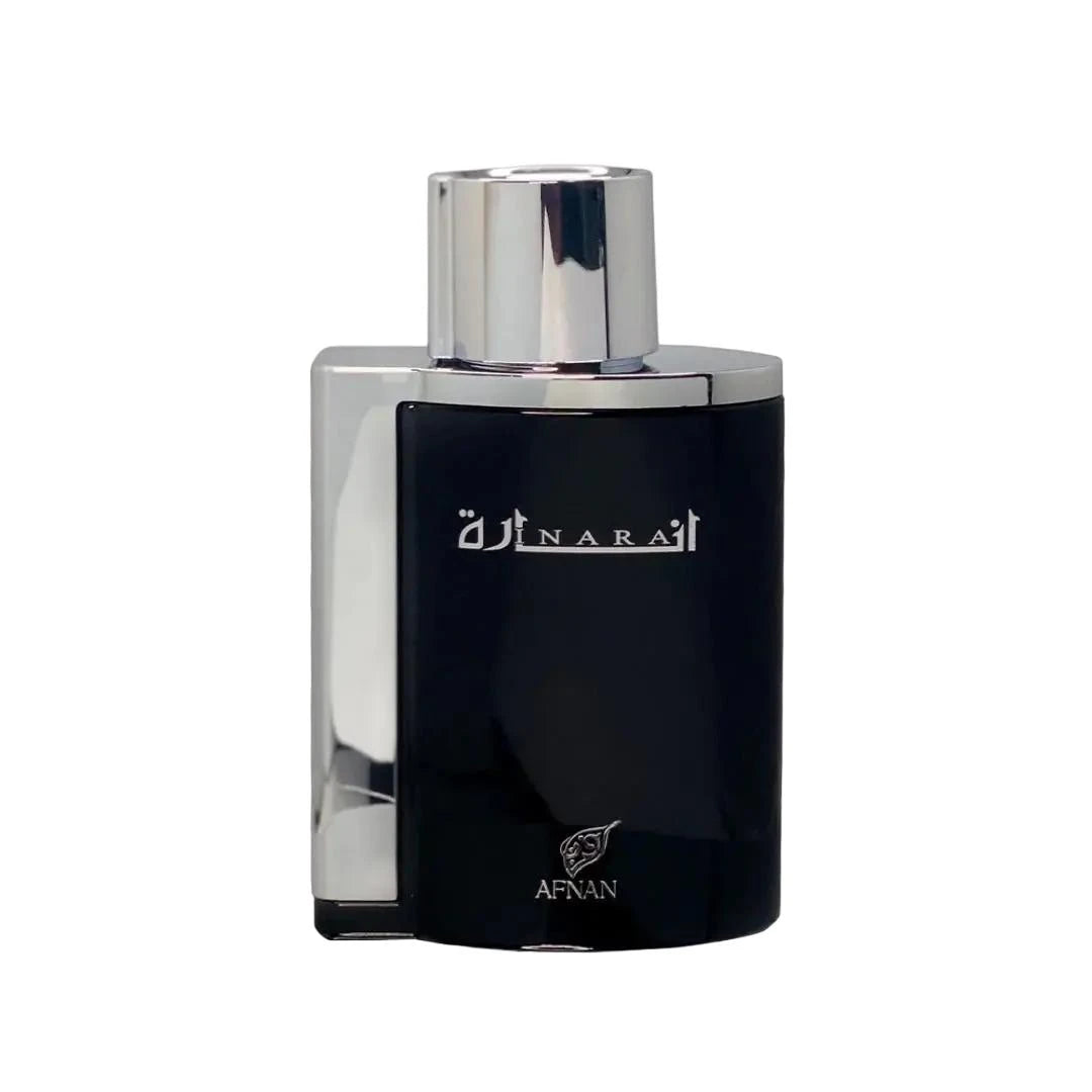 The image shows a rectangular perfume bottle with a dark, opaque body and a metallic silver cap. The front of the bottle has white Arabic calligraphy on the upper part and the word "AFNAN" in uppercase letters at the bottom, with a small rose emblem above it. The background is solid black, which provides a stark contrast to the bottle and highlights its features.