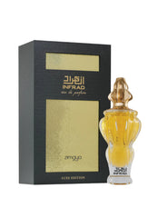 A bottle and packaging of Infrad Luxe Edition Eau De Parfum by Zimaya. The perfume bottle features an elegant, sculpted clear glass design filled with a rich golden liquid, and is topped with a uniquely shaped gold cap. The bottle is labeled “Infrad” in bold black Arabic and English script. The accompanying box is black with gold embossed panels and accents, prominently showcasing the name “Infrad” and “Luxe Edition,” giving the product a premium and luxurious appearance.