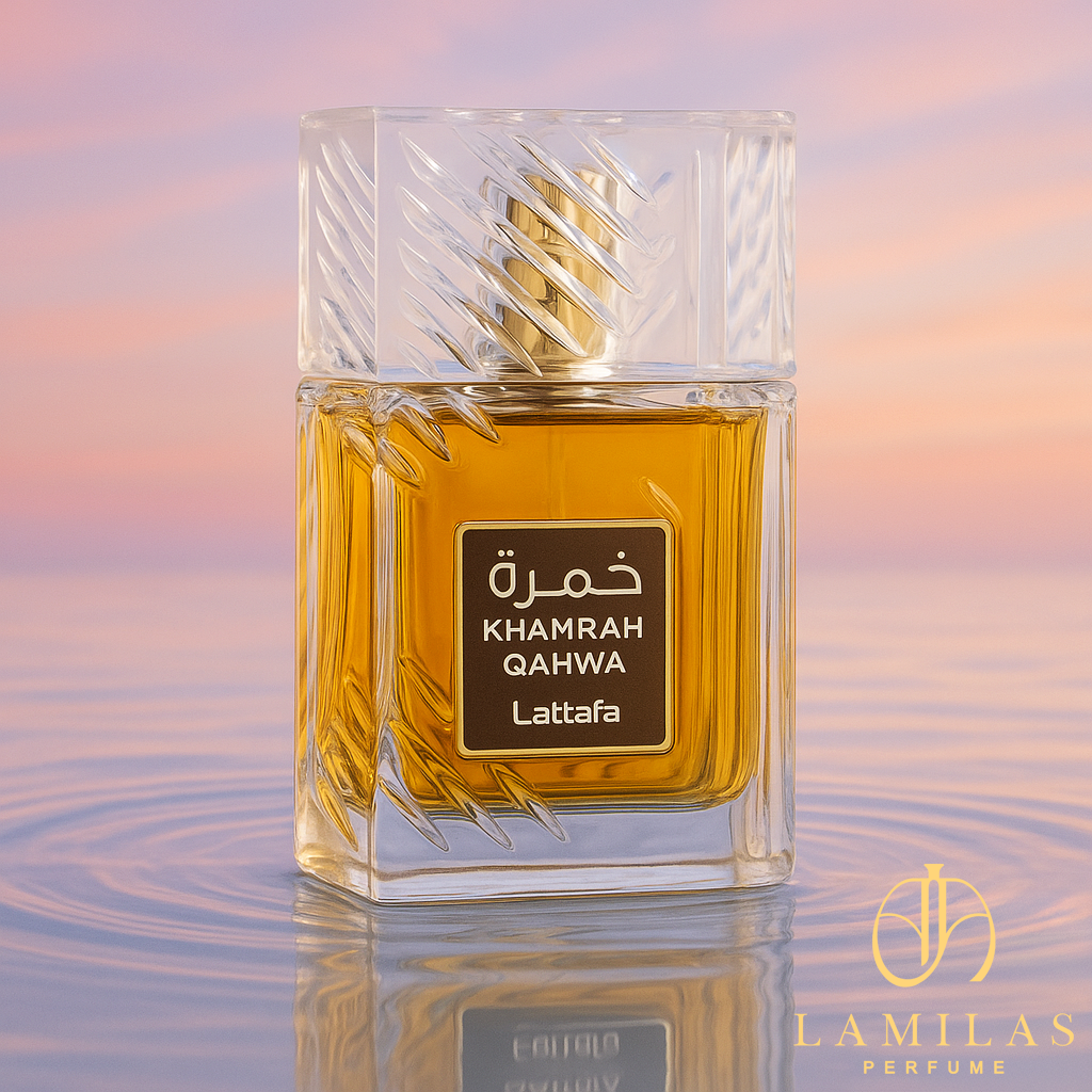 Lattafa Khamrah Qahwa perfume bottle on rippled water with soft pastel sky background.
