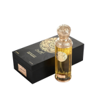 A product image of Gissah’s “Liquid Gold” signature light fragrance: a sleek rectangular black gift box embellished with an intricate gold filigree medallion design and branded in white and gold with “Gissah” (in Arabic and English), “Signature Collection Light Fragrance,” and “200?ml / 6.7?fl oz.”