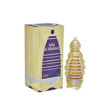 The image shows a product called "Lulu Al Khaleej" by Khadlaj, which is a concentrated perfume oil. The product is packaged in an 18ml bottle. The packaging box is predominantly gold with purple accents and features the product name in English and Arabic.