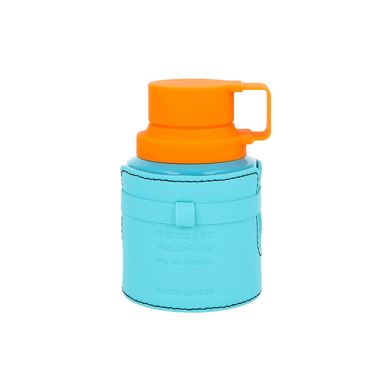 Turquoise perfume bottle in stitched leather sleeve with orange cap handle, labelled Odyssey Mandarin Sky limited edition.