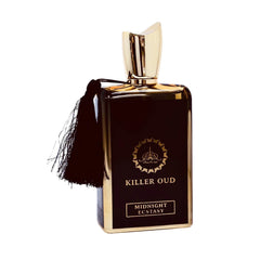 A sleek, rectangular black perfume bottle with gold accents and a tassel attached at the neck, featuring a sculpted gold cap and the words “Killer Oud Midnight Ecstasy” on the front.