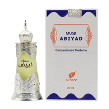 The image shows a bottle of "Musk Abiyad" concentrated perfume by Afnan Perfumes, next to its packaging. The perfume bottle appears to have a traditional design with a silver metallic finish and intricate decorative patterns, topped with a dome-shaped cap. It has a label with Arabic script in green, hinting at the fragrance's oriental inspiration.  The white and blue color scheme of the box contrasts with the silver and green of the bottle, making it stand out.