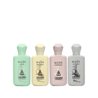 This image features a collection of four musk-inspired perfume bottles from DKHAN Fragrances, lined up against a plain background. Each bottle has a distinct pastel color and geometric cap design, corresponding to the fragrance it holds. From left to right: the first bottle is a soft mint green labeled "MUSK LOLO," the second is a gentle yellow with "MUSK MANGO," the third is a pale pink for "MUSK POWDER," and the fourth is a light grey labeled "MUSK CHOCO."
