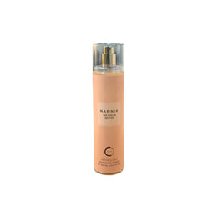 A tall, slender cylindrical bottle of “Narnia The Polar Edition” fragrance mist with a pale peach-colored label, a gold-toned spray nozzle, and a clear plastic cap.