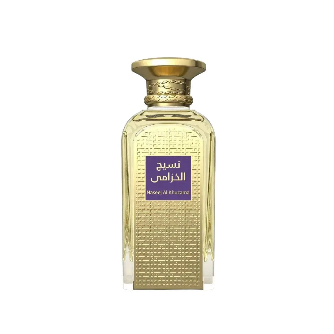 The image is of a perfume bottle with a rich golden color and textured design. The bottle has a rectangular shape with a curved top and a broad, flat base. The cap is a smooth, polished gold matching the bottle's texture. On the front, there is a purple label with Arabic script, which translates to "Naseej Al Khuzama," indicating the name of the fragrance. The text below the Arabic script, in smaller font, is the English transliteration of the name.
