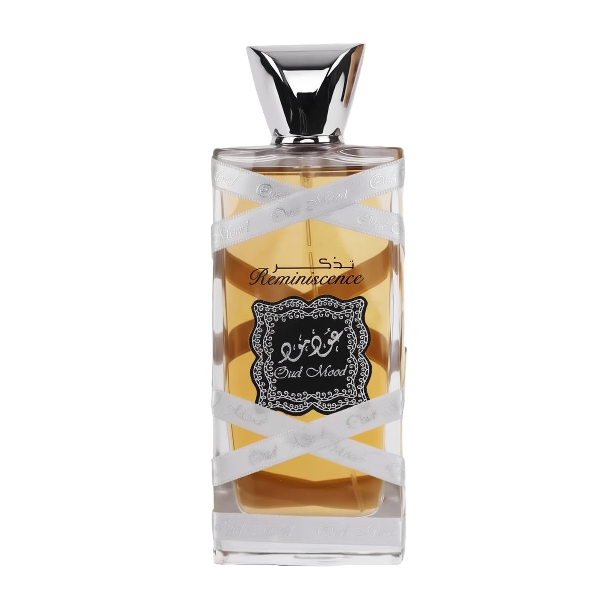 The image displays a perfume bottle with the following attributes:  The bottle is rectangular with a clear glass design, allowing a view of the amber-colored perfume inside. A silver ribbon with the words "Oud Mood" printed in a repeating pattern wraps around the bottle. The central label is ornate with a black background and white decorative border; it features Arabic calligraphy and the word "Reminiscence" in English script.