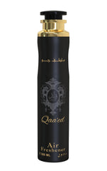 A tall, black cylindrical air freshener can with gold detailing and ornate Arabic calligraphy, labeled ‘Qaa’ed’ by Lattafa, containing 300ml.