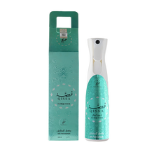 Qissa Turquoise air freshener bottle with matching teal patterned box.