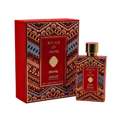 The image shows a product named "Rituals of Anfar Divine" by Anfar London. The packaging features a bold and intricate design with geometric patterns in vibrant colors, including red, gold, blue, and black, evoking a traditional and luxurious aesthetic. T