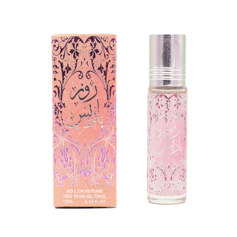 Pink floral roll-on perfume bottle with matching decorative box featuring Arabic script.