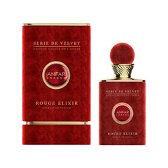 The image features the "Rouge Elixir Extrait De Parfum" from the "Serie De Velvet" collection by Anfar. The perfume bottle is covered in a luxurious, velvety red finish, complemented by a round red cap with a gold collar for an opulent look. The front of 