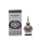 The image shows a product called "Shamookh" by Khadlaj, which is a concentrated perfume oil. The perfume comes in a 20ml spherical bottle with a silver finish, featuring intricate patterns and a pointed cap that adds a touch of elegance. The design includes decorative elements with purple accents, enhancing its luxurious appearance. The packaging box matches the bottle's design, with a silver and purple theme, featuring the product name "Shamookh" in bold letters and additional ornamental details.