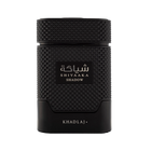 Khadlaj Shiyaaka Shadow black perfume bottle with a textured, studded design on the body and cap, isolated on white.khadlaj-shiyaaka-shadow-black-textured-perfume-bottle.jpg
