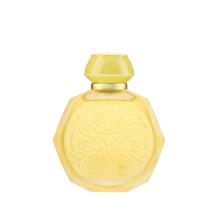 A yellow octagonal perfume bottle with intricate embossed designs on the front. The bottle features a matching yellow cap and a gold collar, adding a touch of elegance to its vibrant appearance. The design elements give the bottle a sophisticated and luxurious look, perfect for a high-end fragrance.