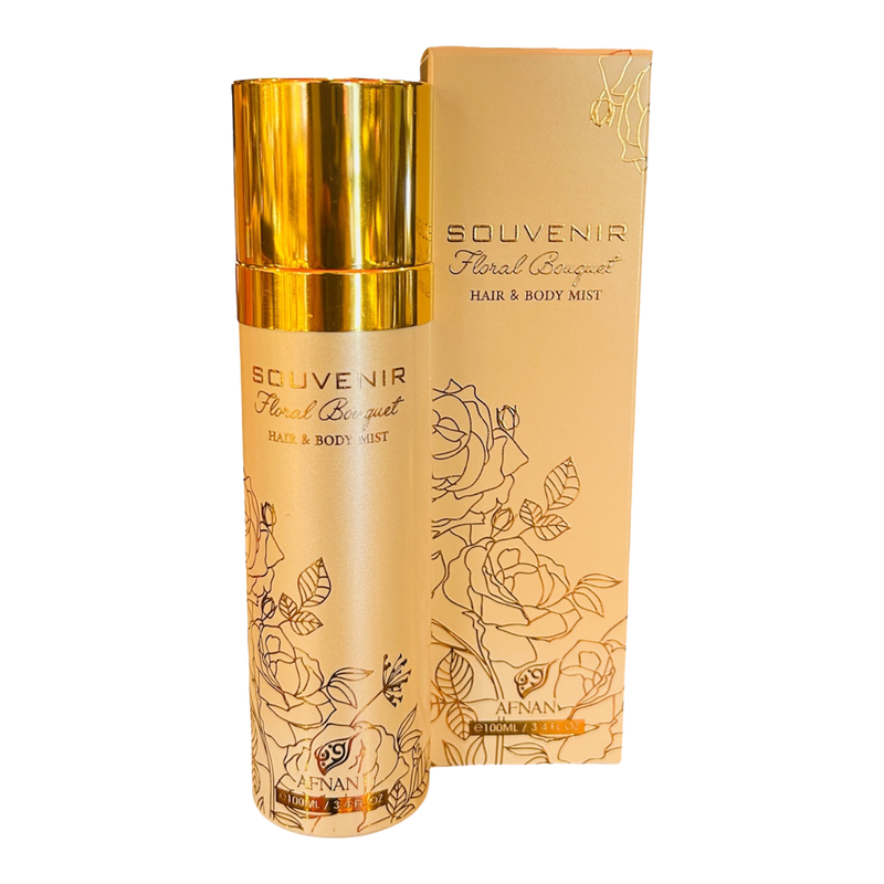 Afnan Souvenir Floral Bouquet Hair & Body Mist in a gold bottle with floral line art and matching gold box beside it.