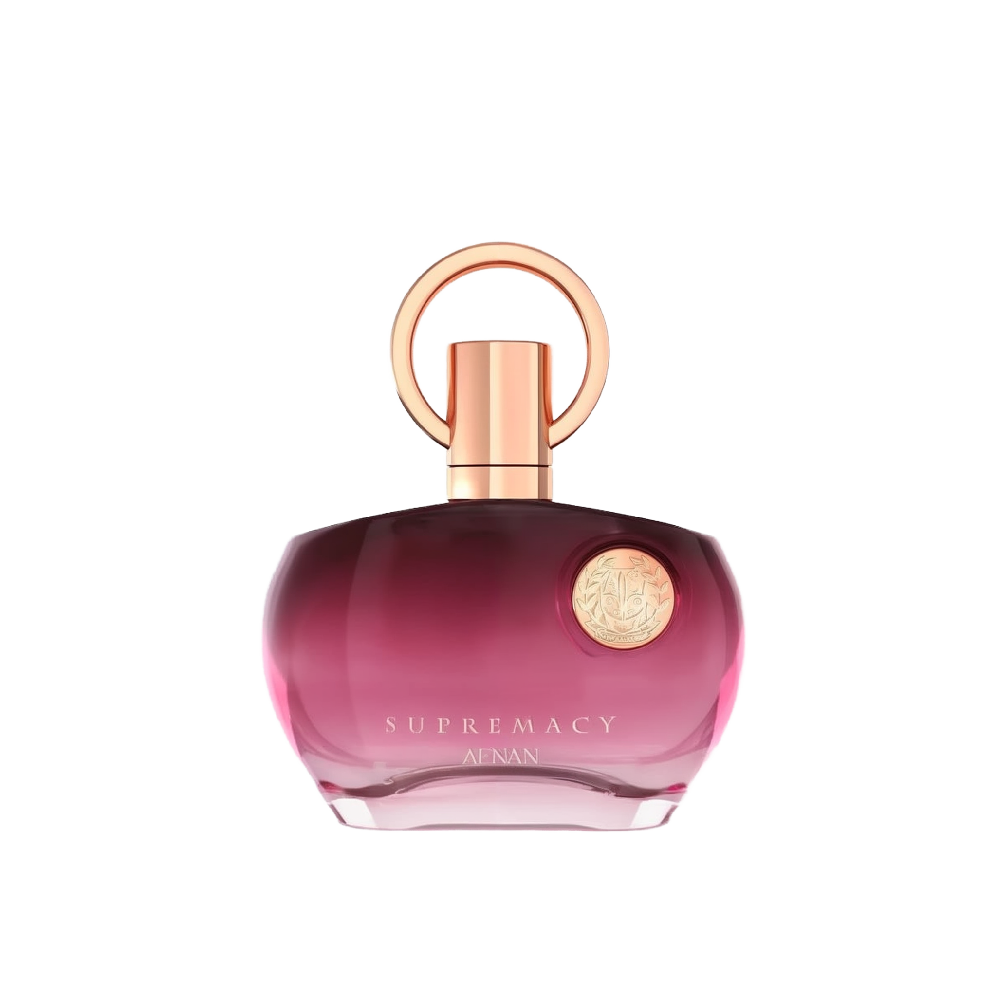 The image shows a perfume bottle with a distinctive design. It has a round, flat base with a gradient color that shifts from transparent to a deep pink hue towards the bottom. The cap is a metallic rose gold color, featuring a simple yet elegant circular design that loops around the nozzle. The front of the bottle has a metallic emblem with intricate detailing, adding a touch of luxury. The text on the bottle reads "SUPREMACY AENAN". 