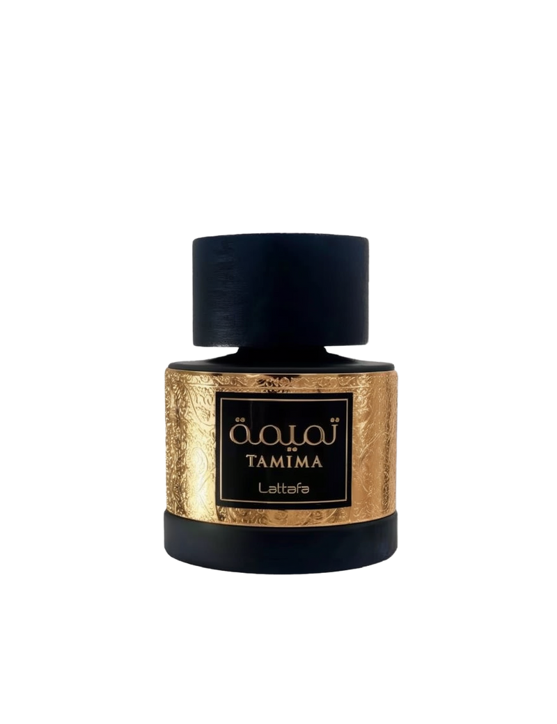 The image shows a perfume bottle from Lattafa named "Tamima." The bottle has a round, stout shape with a matte black finish. The label area features a gold, intricately patterned design that wraps around the bottle, with the name "Tamima" written in Arabi