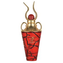 Taraf Eau De Parfum by Lattafa in a luxurious red and gold bottle with a cracked design and golden cap.