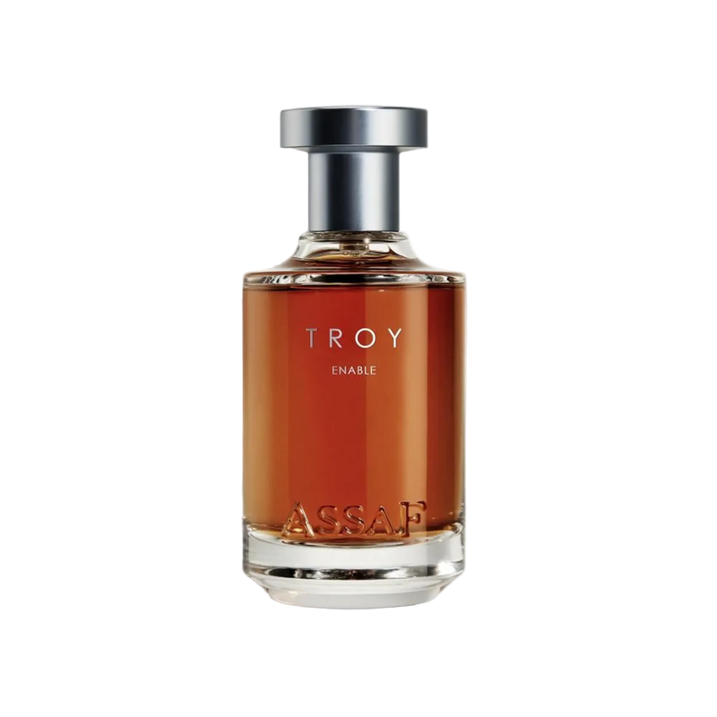 Assaf Troy Enable perfume bottle with amber fragrance and silver cap.