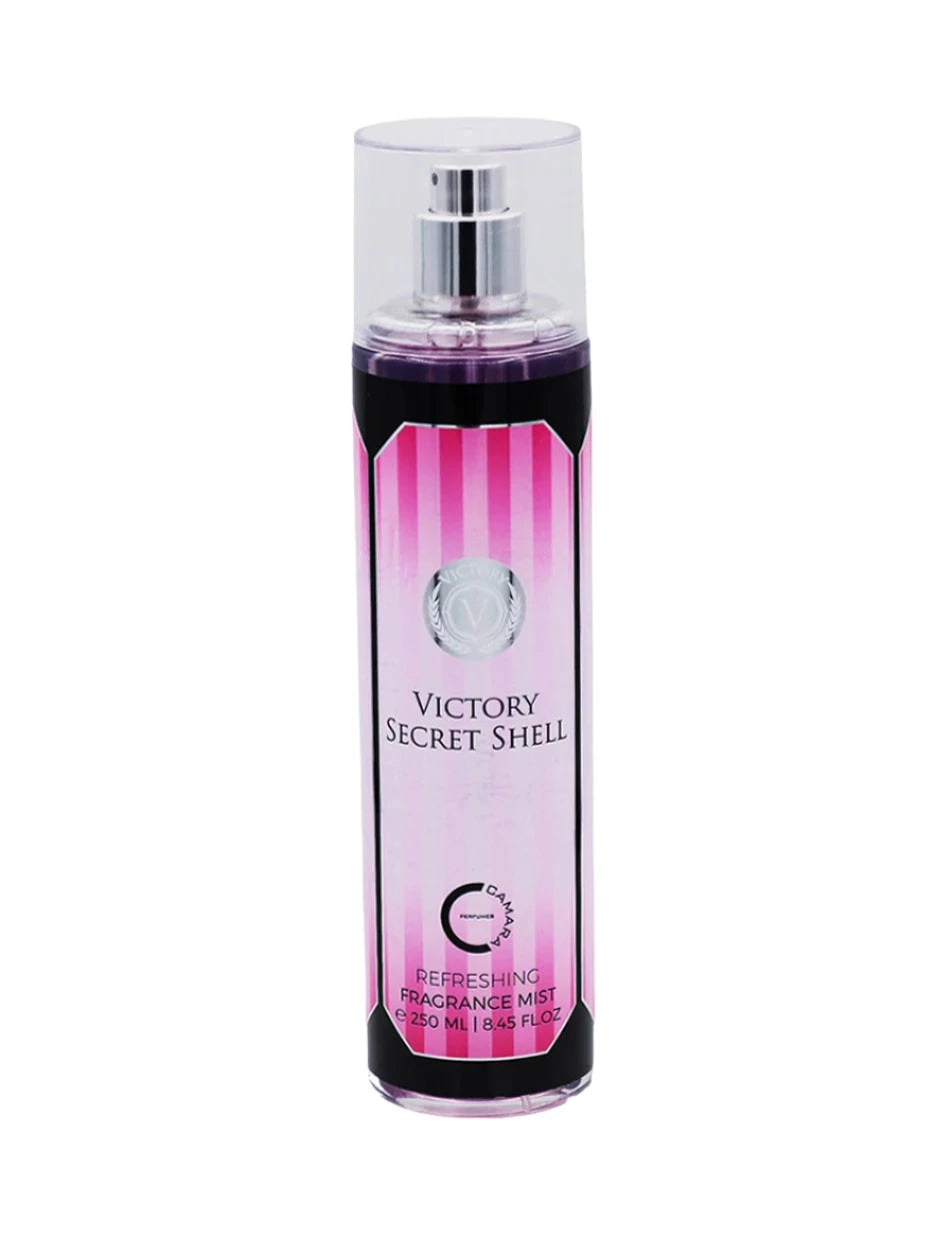 A tall, cylindrical fragrance mist bottle featuring vertical pink stripes on its label, a clear plastic cap, and silver spray nozzle. The words “Victory Secret Shell” and “Refreshing Fragrance Mist” appear in black text, with an indicated volume of 250 mL (8.45 fl oz).