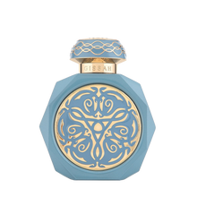 Gissah Vitus perfume in a blue and gold ornate octagonal bottle.