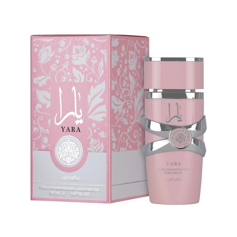 Yara pure concentrated perfume oil by Lattafa, featuring a soft pink bottle with silver accents displayed beside its matching pink box.