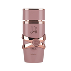 Lattafa Yara Elixir perfume bottle in dusty pink with rose gold accents and Arabic script, featuring a round emblem detail.
