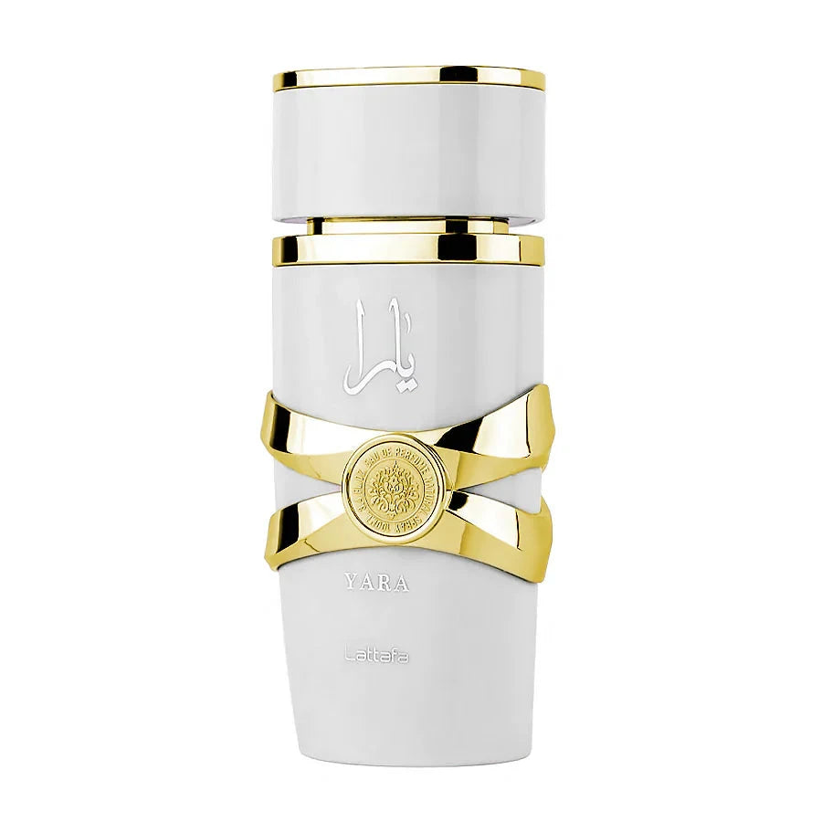 This image displays a cylindrical perfume bottle for "YARA" by Lattafa. The bottle has a matte white finish with glossy white caps at both ends. It features a striking gold band in the middle, styled to have a ribbon-like appearance, and a round gold embl